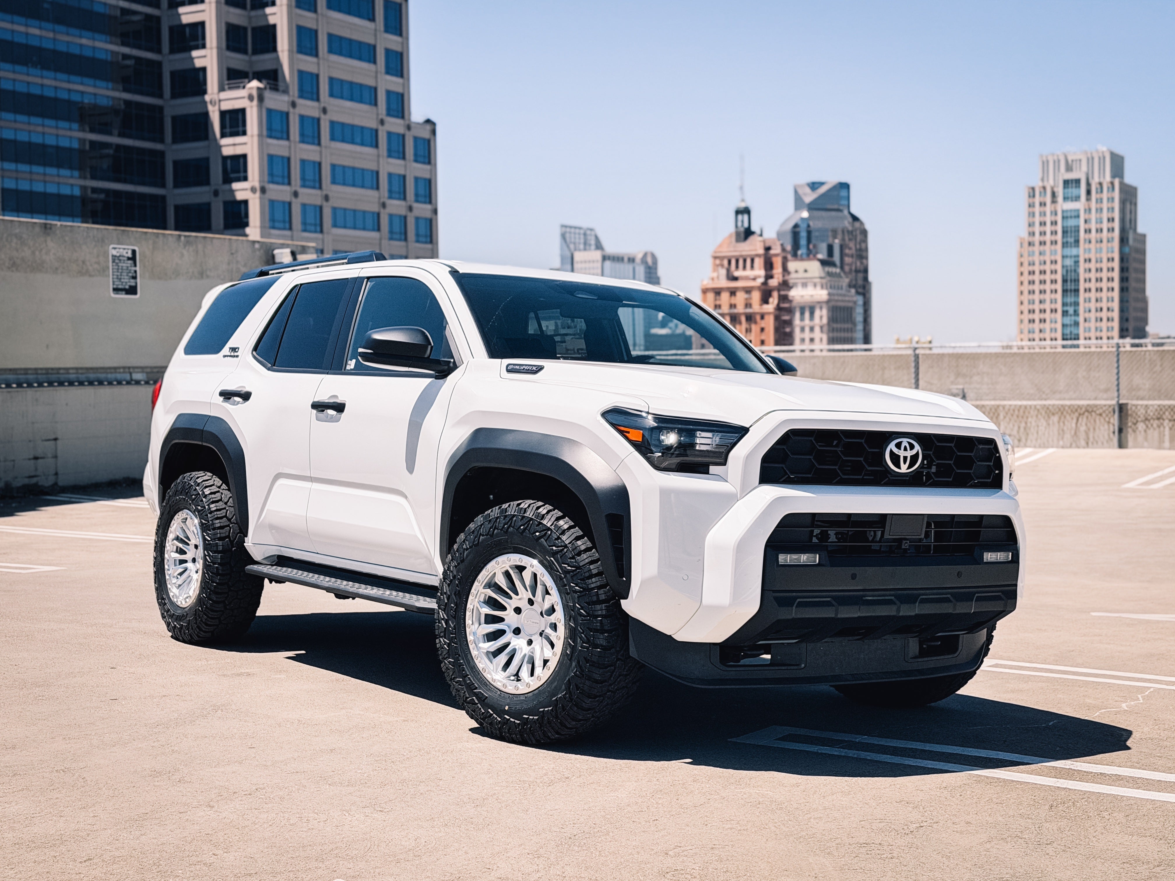 AGP wheels fitted to a white Toyota 4Runner